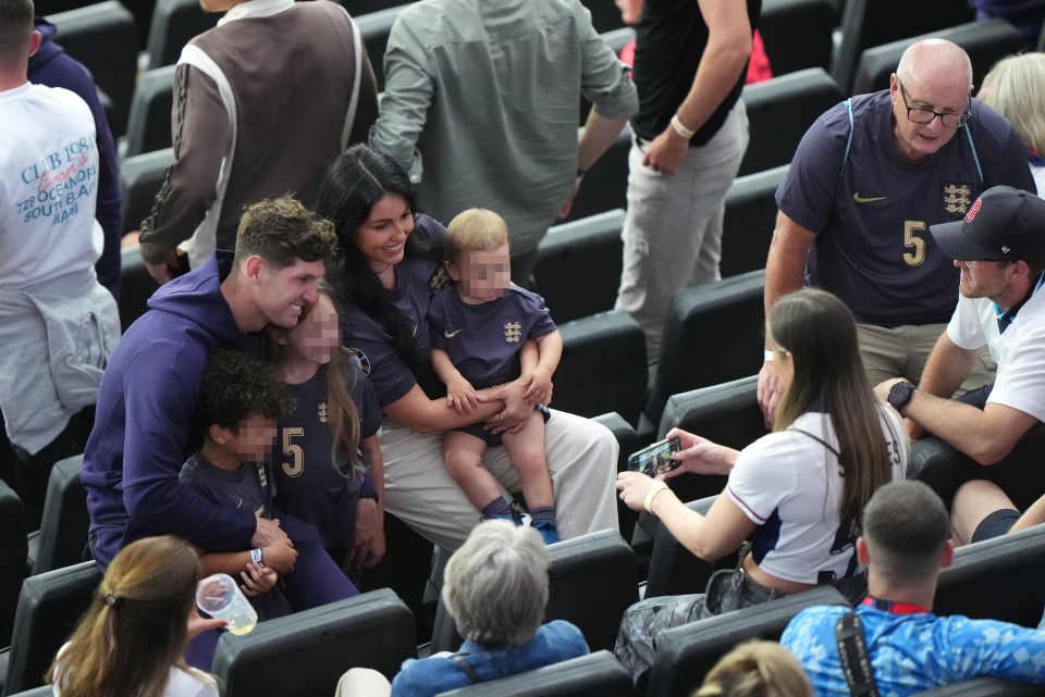 John Stones posed for a snap with his family