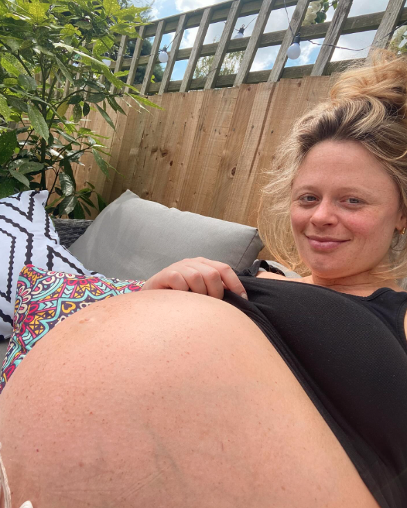 Emily Atack showed off her huge baby bump earlier in the week