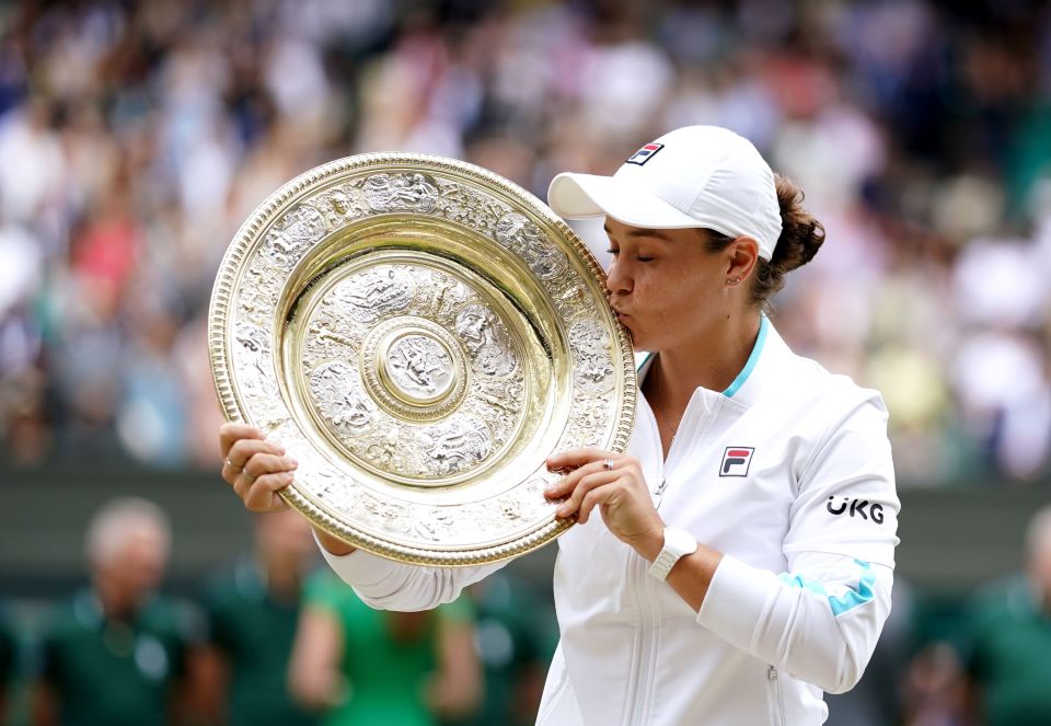 File photo dated 10-07-2021 of Ashleigh Barty celebrates with her trophy after winning the ladies' singles final match against Karolina Pliskova at The All England Lawn Tennis and Croquet Club, Wimbledon. World number one Ash Barty has announced her retirement from professional tennis at the age of 25. The Australian, who has won three grand slams and is the reigning Wimbledon and Australian Open champion, said she was retiring from the sport for a second time to ¿chase other dreams¿. Issue date: Wednesday March 23, 2022. PA Photo. See PA story TENNIS Barty. Photo credit should read Adam Davy/PA Wire.