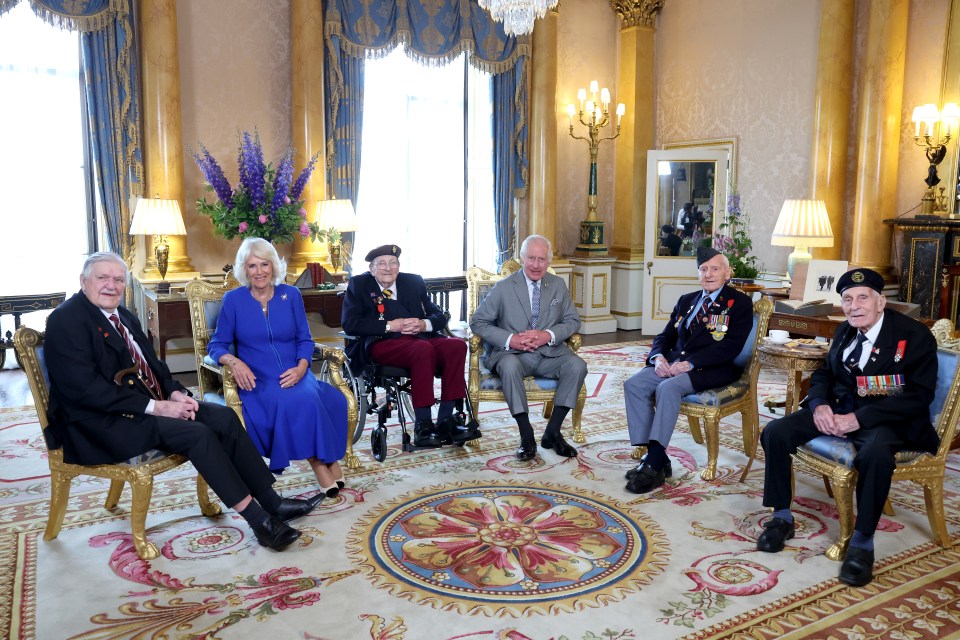 D-day heroes Arthur Oborne, Jim Miller, Bernard Morgan and John Dennett at Buckingham Palace with Camilla and Charles