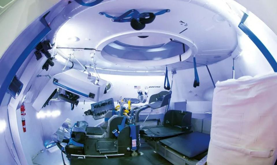 Two astronauts are set to travel in the white capsule, which can accommodate up to seven people