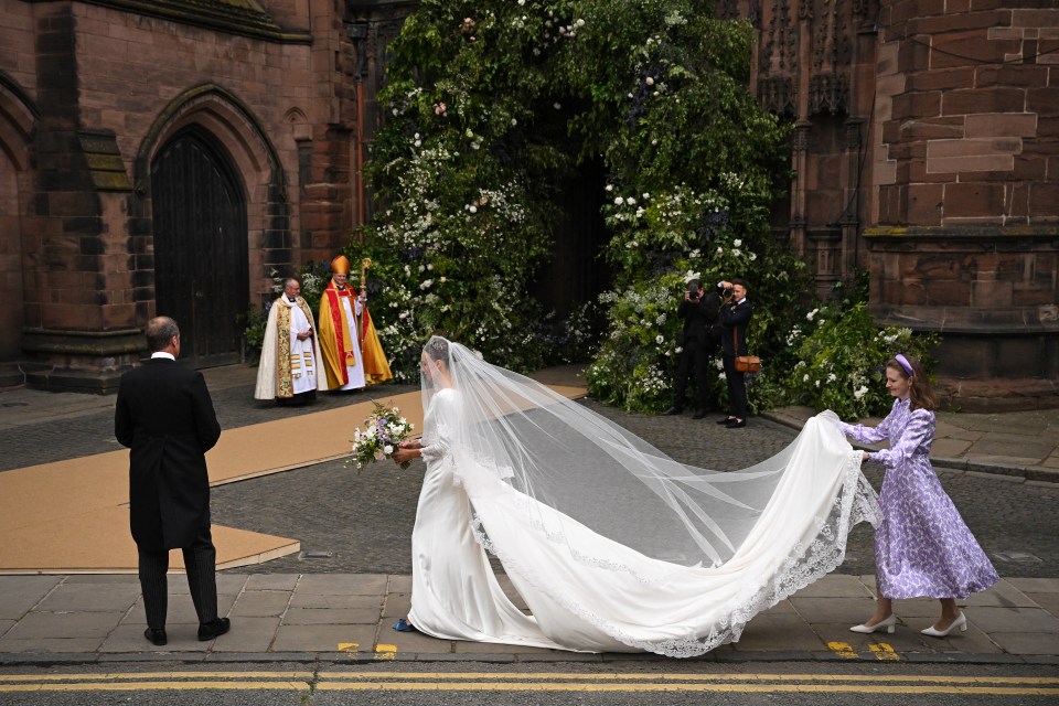 Olivia's dress and veil were designed by Emma Victoria Payne