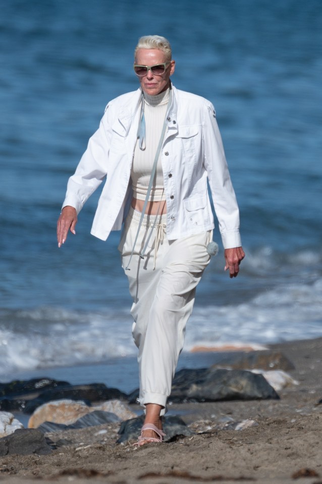 Brigitte showed off her youthful looks as she strolled a beach in Marbella