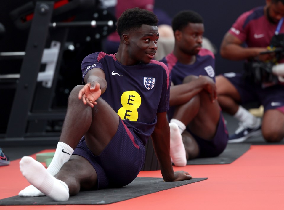 Arsenal forward Bukayo Saka, 22, was among those stretching out