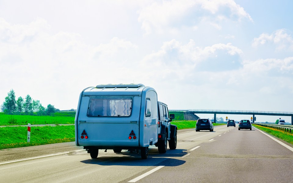 If you comply with the law, you can tow your caravan on a motorway