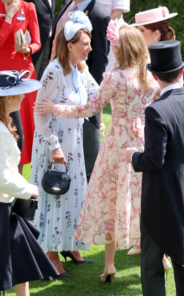 Carole exchanged a hug with Princess Beatrice of York