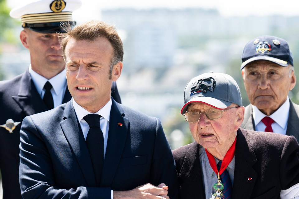 France's President Emmanual Macron pictured with a veteran at the D-Day celebration