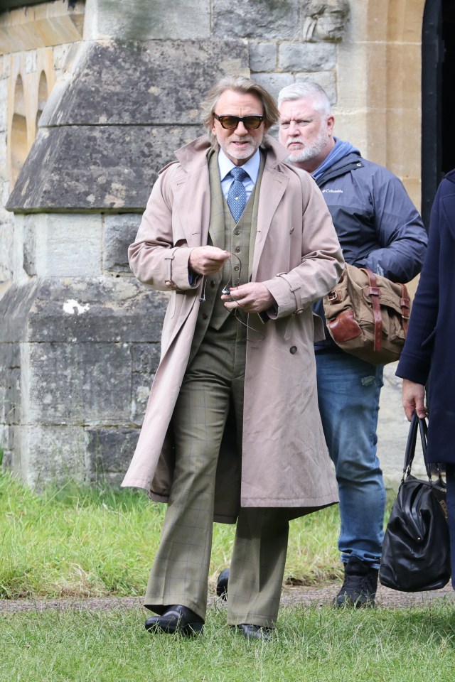 Daniel Craig was seen wearing a three-piece tweed suit and a mac on set this week