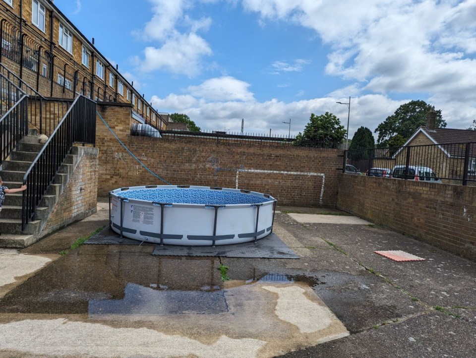 The 12ft paddling pool in the communal yard