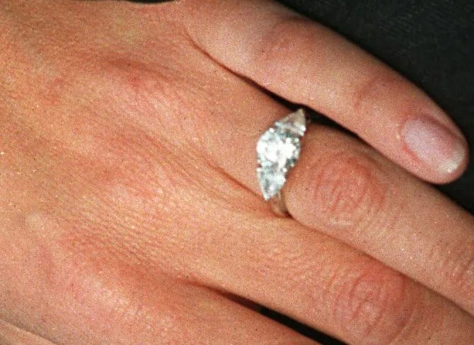 The Duke of Edinburgh popped the question with a £105,000 two-carat oval diamond engagement ring from Garrard