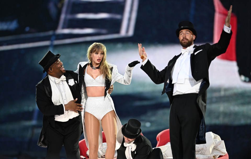 Taylor Swift is joined on stage by Travis Kelce on June 23