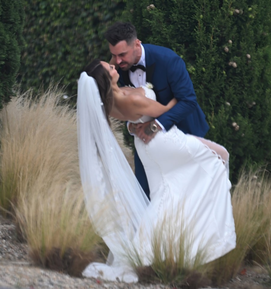 The newlyweds looked blissfully in love as they posed for pictures