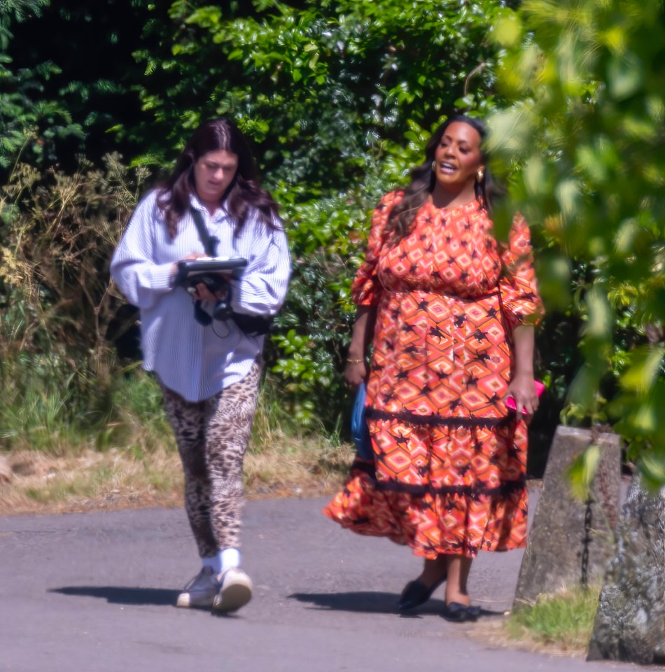 Host Alison Hammond could be seen nattering with a producer