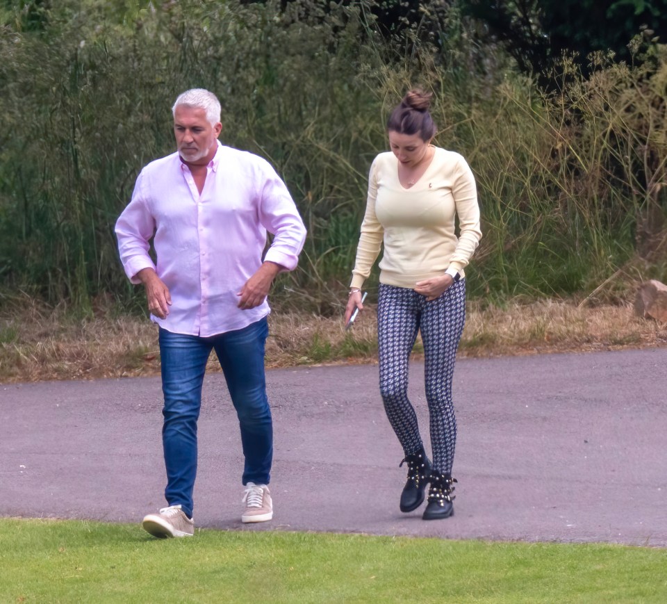 Judge Paul looked smart for his day of filming in a pink shirt and mid-wash jeans