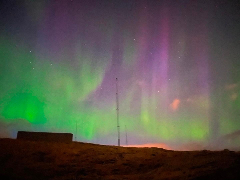 Hearing a rumour that the Northern Lights are likely to appear, I scramble up the hill at about midnight and am rewarded with a spectacular show of colour