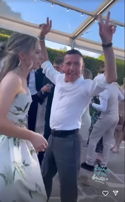 Ever the showman, Frankie couldn't help but bust out some moves on the dancefloor alongside daughter Ella at her wedding