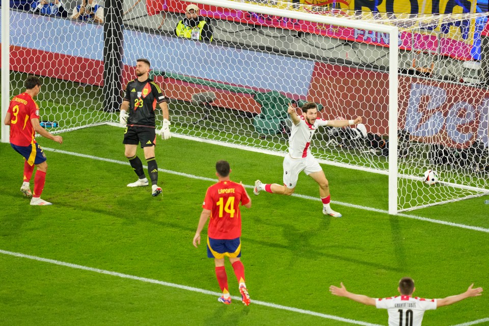 Georgia stunned Spain by opening the scoring with an own-goal by Robin Le Normand