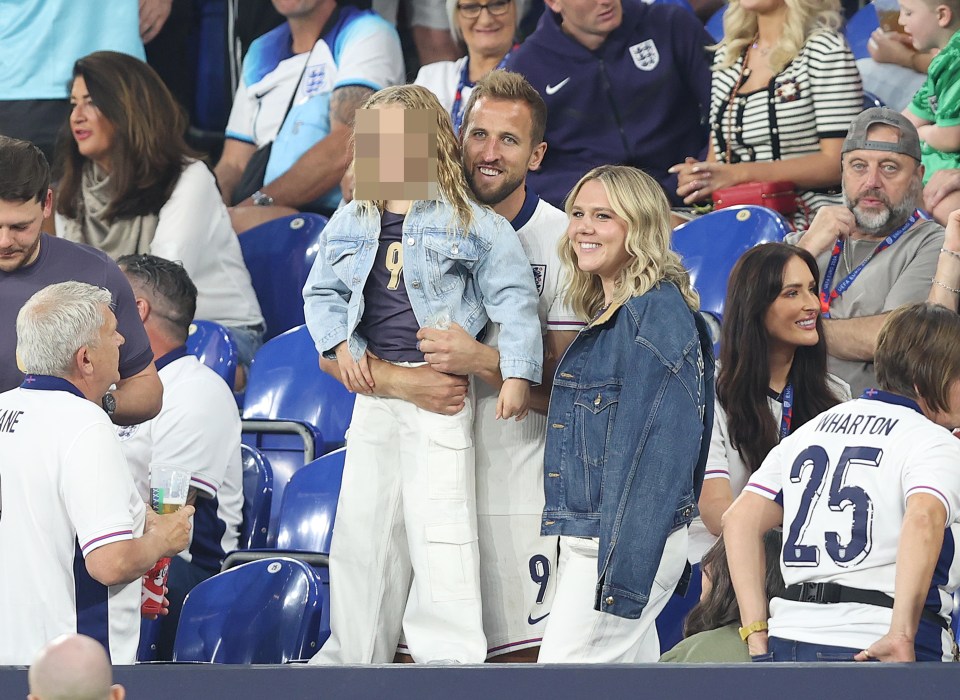 England captain Harry Kane celebrated beating Slovakia with his wife and daughter