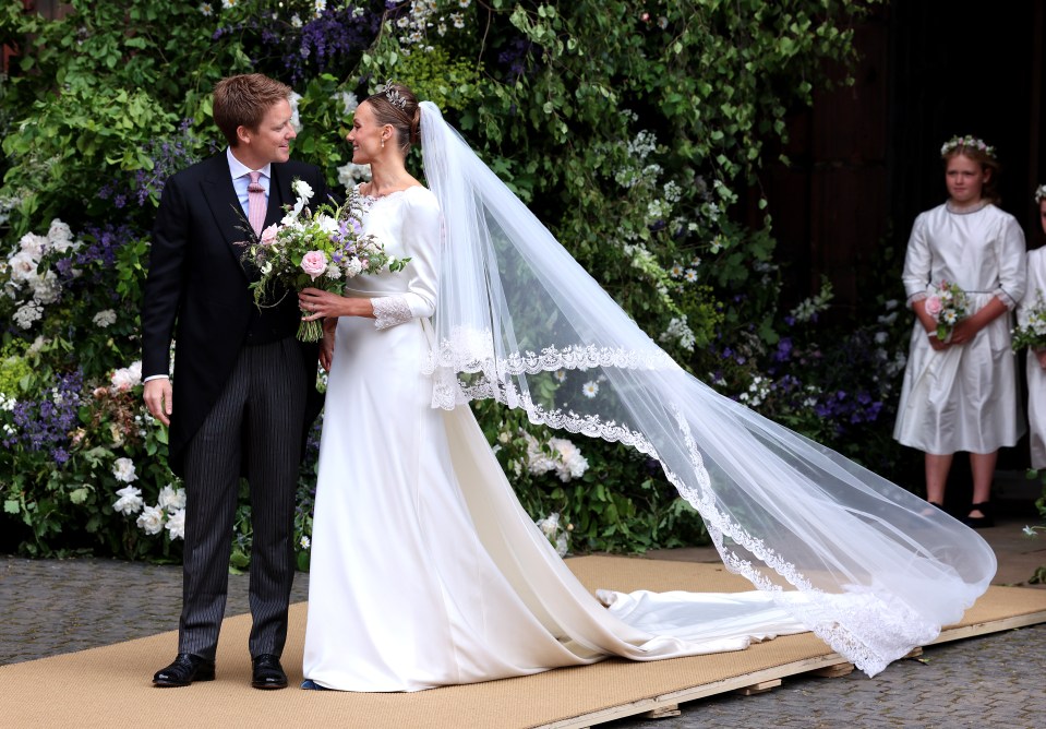 Hugh Grosvenor and Olivia Henson shared a kiss outside Chester Cathedral