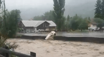 A car was seen hanging by a thread before falling into the water