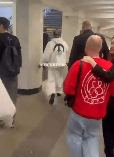 Ye was said to have been seen walking through the Moscow subway in a white outfit