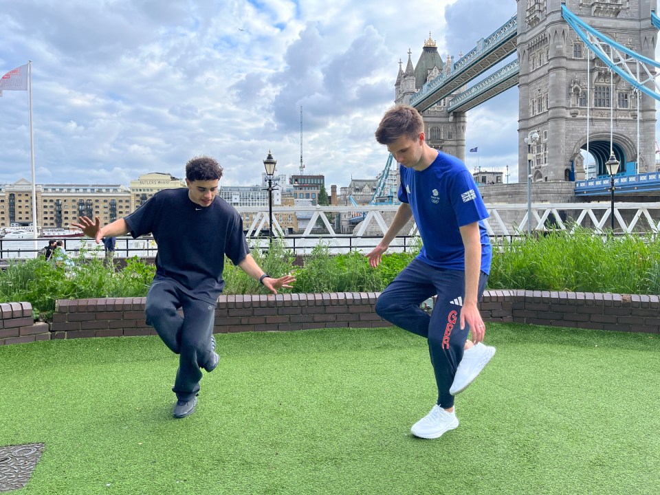 a man wearing a blue shirt that says ' england ' on it