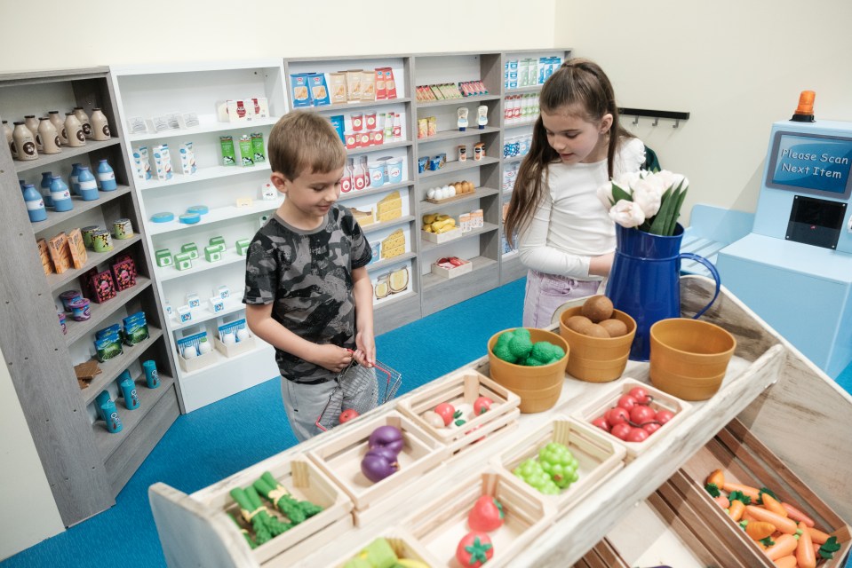 Kids can use their credit cards to buy things at the shop