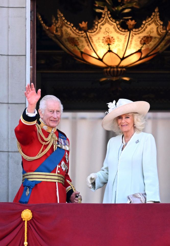 Charles and Camilla waved to cheering crowds