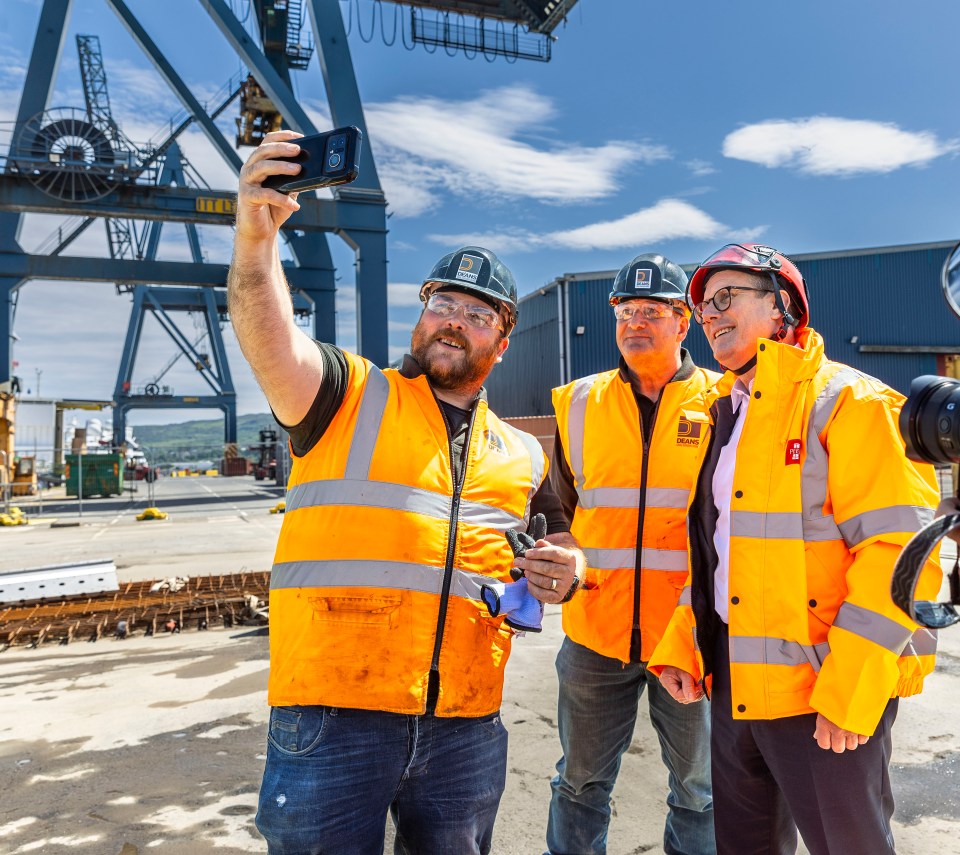 The Labour Leader takes a selfie with workers at the Port of Greenock, near Glasgow