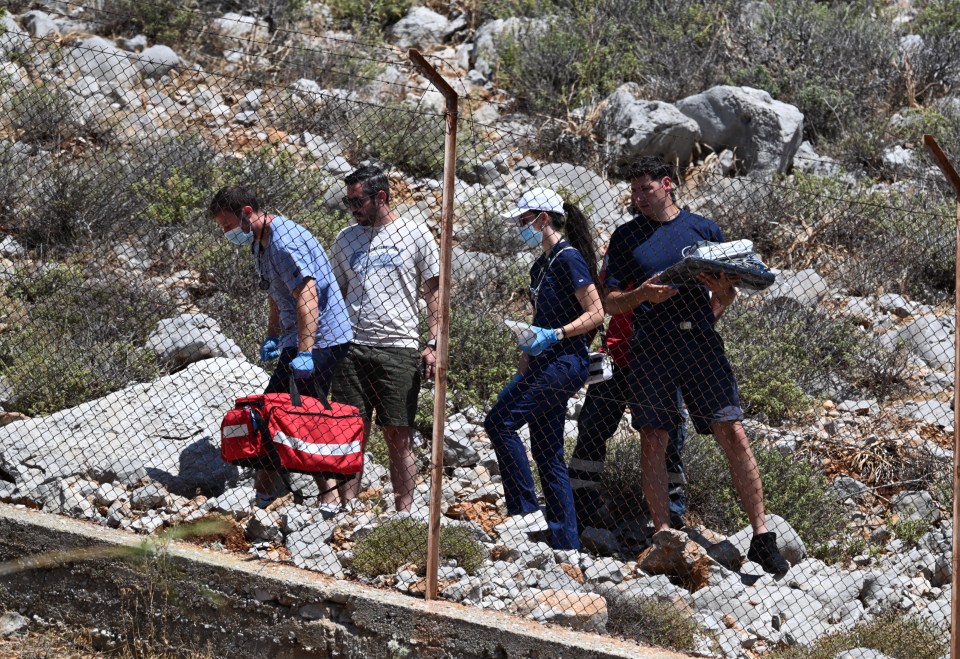 Emergency responders at the scene where Dr Mosley was found near the rocky path police feared he have taken