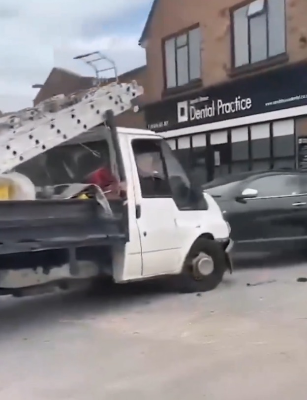 The driver then suddenly swerves right smashing straight into a black car