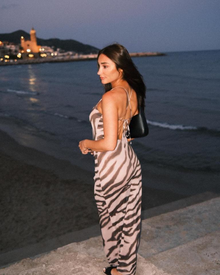 Coco who starred on Love Island 2022, looking stylish and elegant by the sea