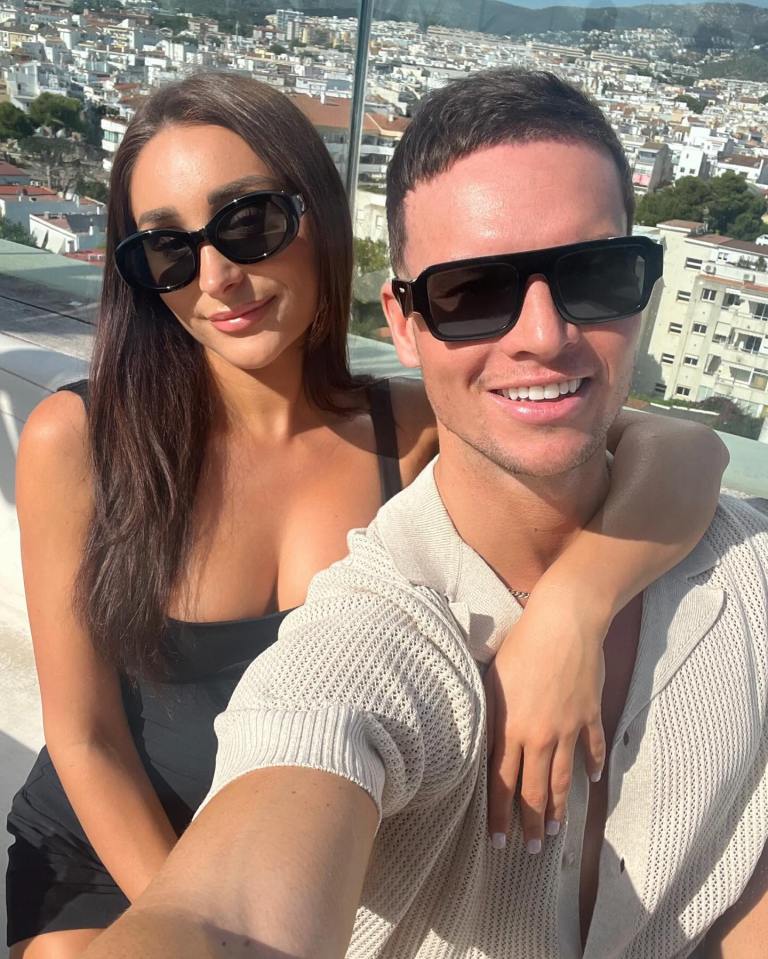 The duo seem very much in love as they enjoyed the scenery in the Spanish coastal town