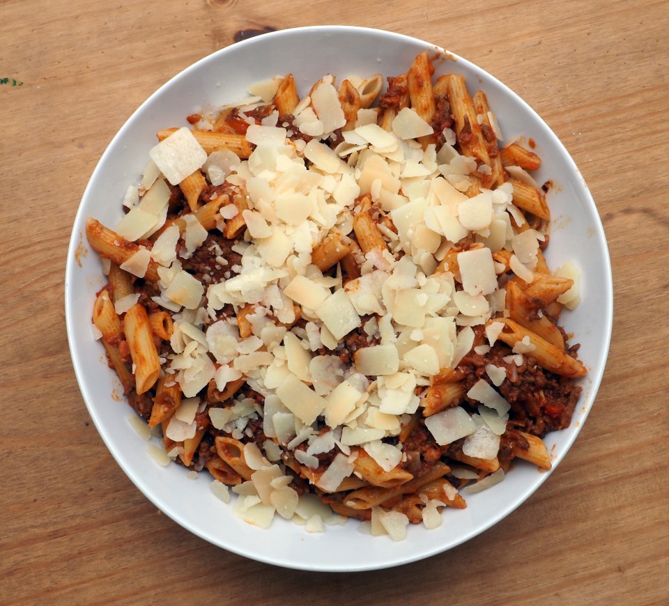 The bolognese tastes really good, according to Lexi, but she found grating the vegetables quite tricky