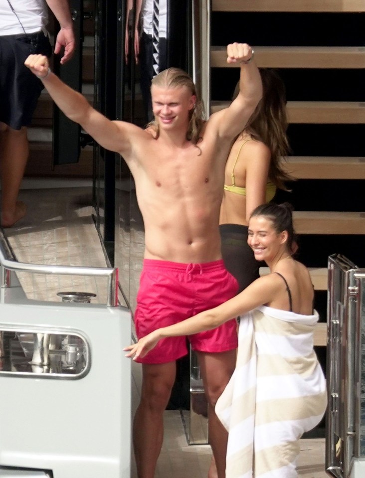 The Man City star wore some pink swim trunks