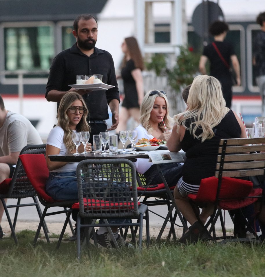 They were seen enjoying some food during their stroll