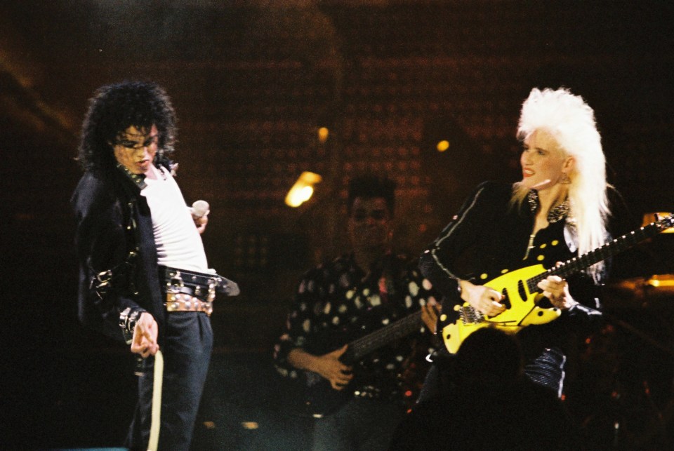 Jackson and Batten perform on stage on his Bad tour at Wembley Stadium on July 23, 1988