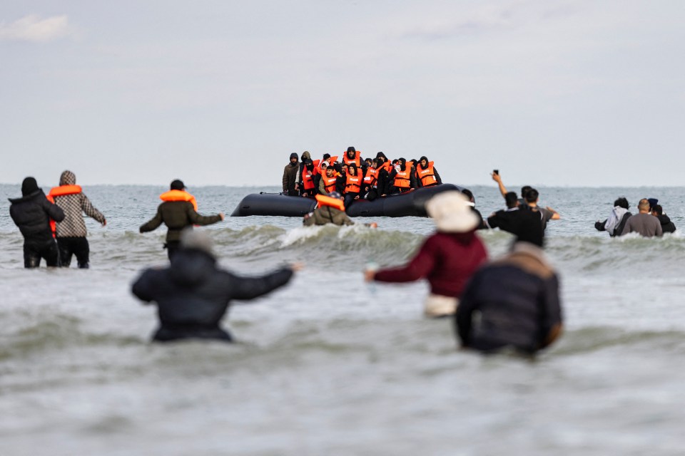 Small boats loaded with migrants leave France