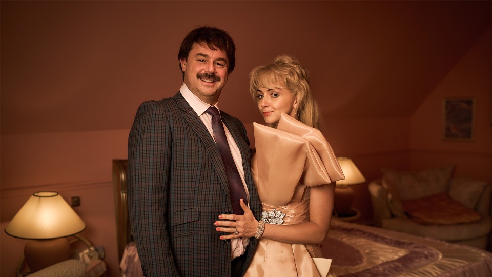 Danny Dyer features in the series, complete with an Eighties barnet and tash, pictured with co-star Lisa McGrillis