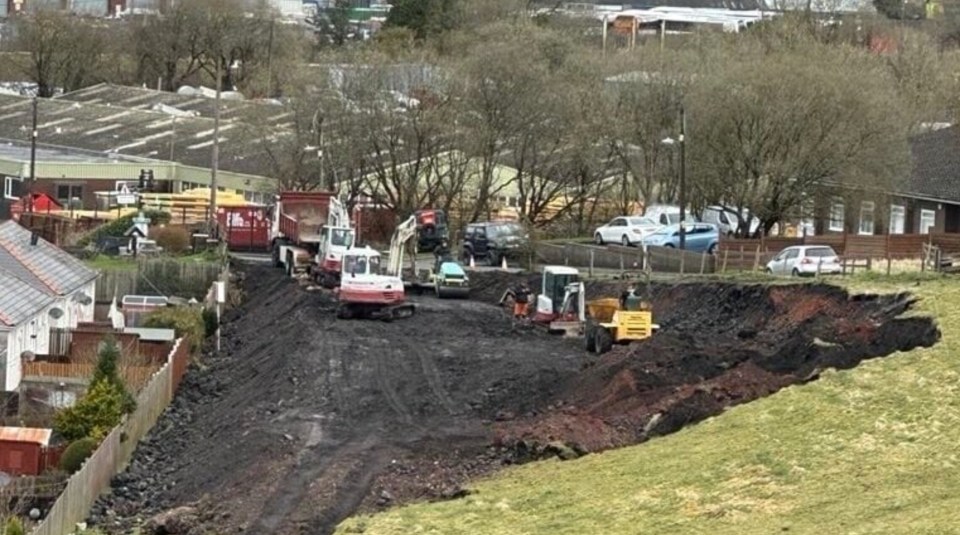 The travellers have dug a huge chunk out of the hillside