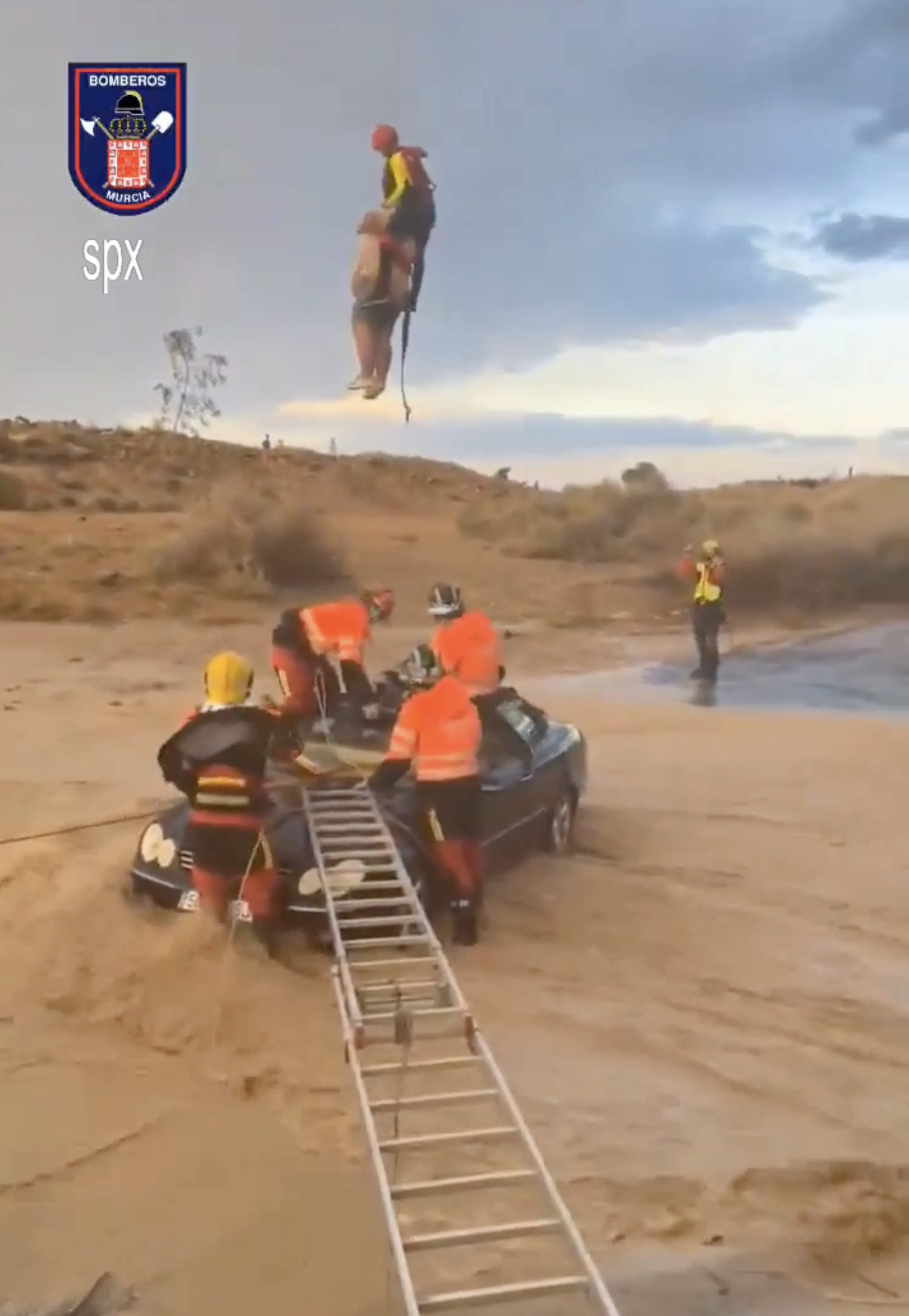 A woman with limited mobility was trapped inside the car during floods