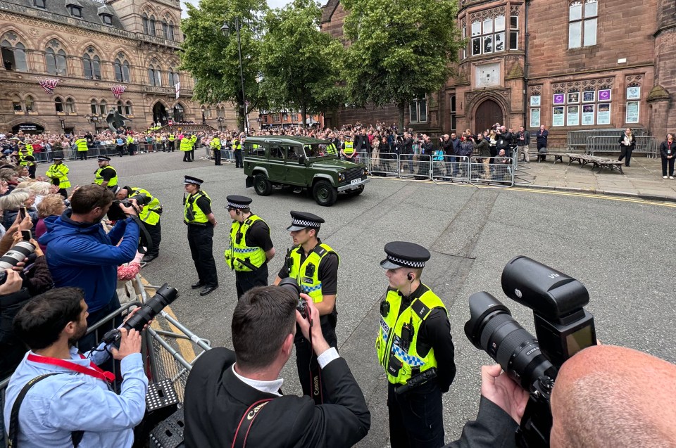 The groom arrived in a green Land Rover similar to the late Prince Philip's