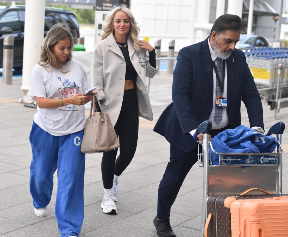 Luke Shaw's partner Anouska Santos and Jordan Pickford's wife Megan leave for Germany