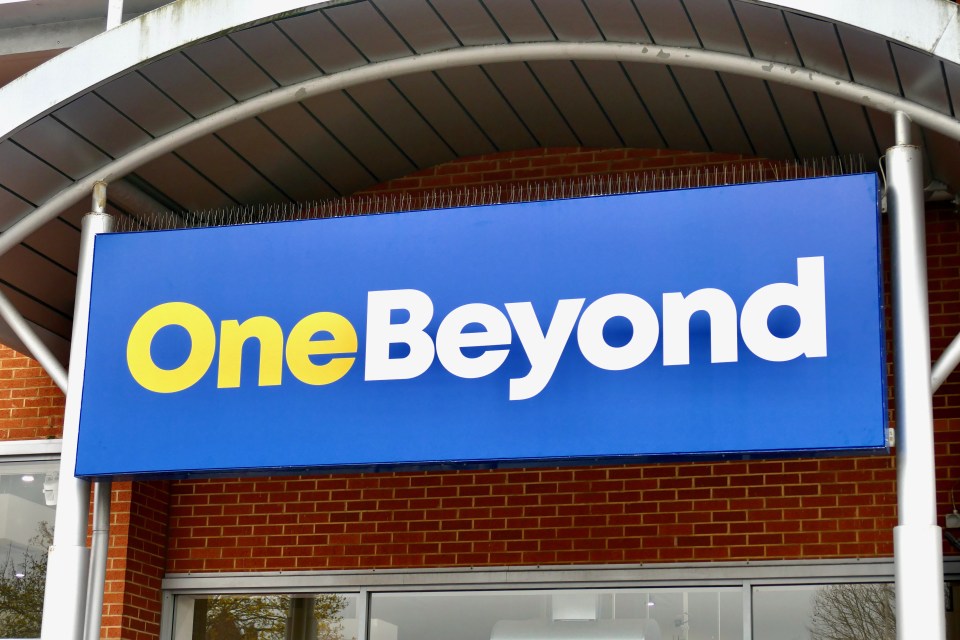 a blue sign that says one beyond on it