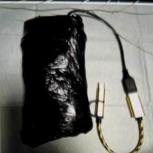 One of the explosive devices found during Monday's raid in the terror suspect's room