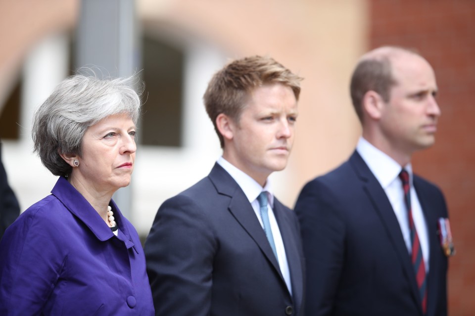 Then-Prime Minister Theresa May pictured with Hugh and Wills in 2018