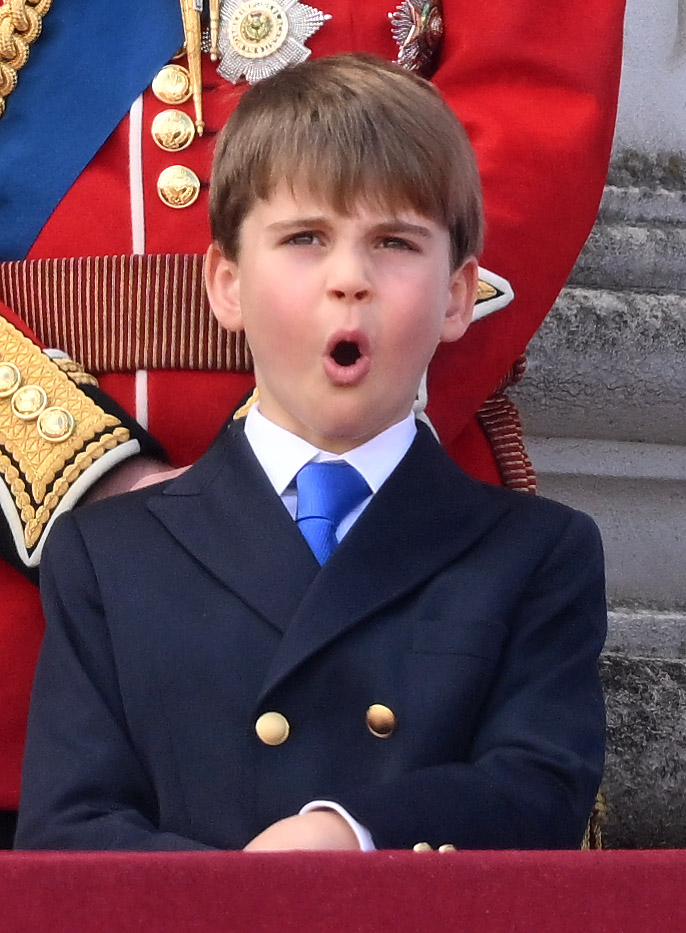 Prince Louis watched in awe at the Red Arrows flypast