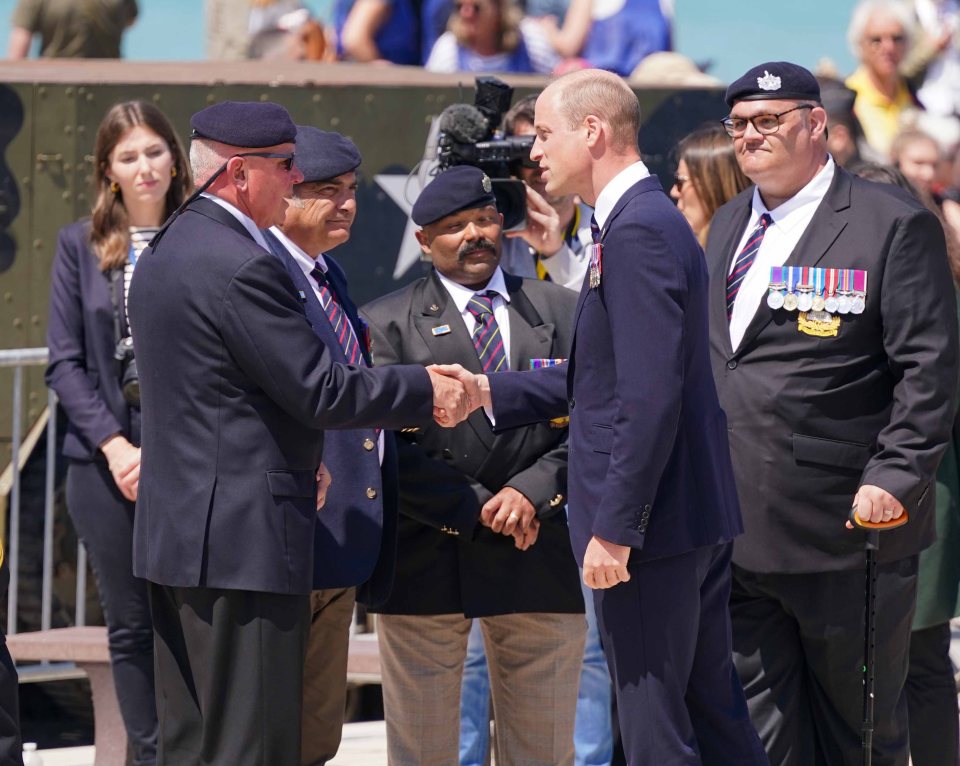 The Prince of Wales chats with veterans from Gloucestershire regiment