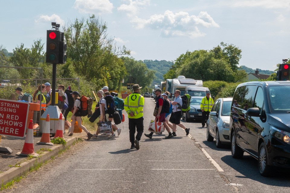 a sign on the side of the road says austrian crossing in red shows here