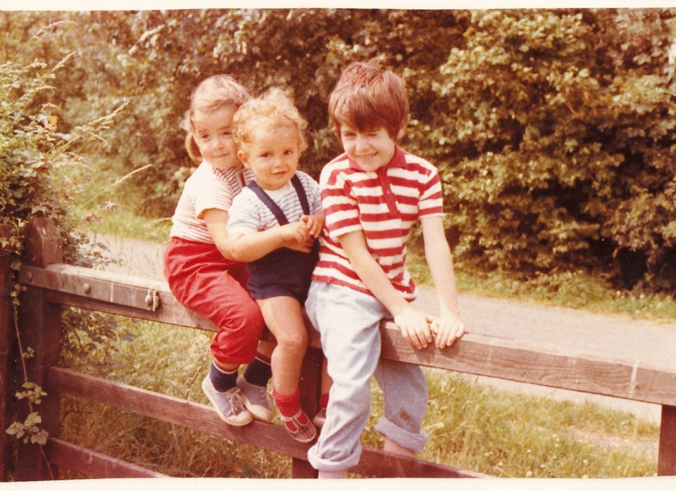 Tom Yeo (far right), pictured with his adoptive siblings, knew nothing about where he came from